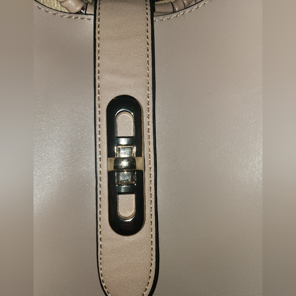 Purse light brown. Smaller purse inside bigger purse